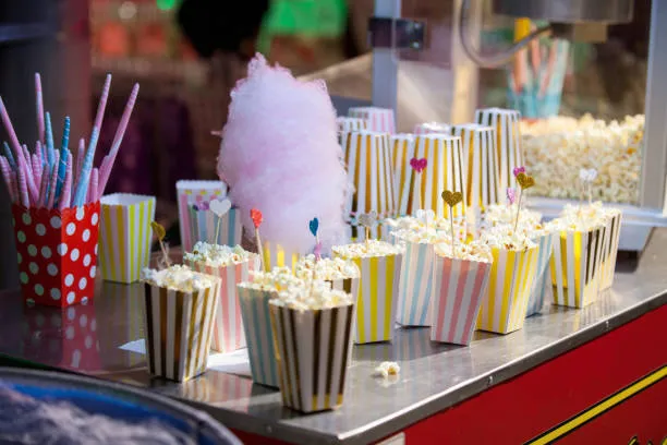 Duelo de Titanes Dulces: ¿Palomitas o Algodón de Azúcar para tu Evento?